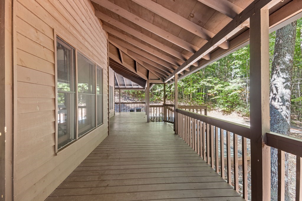 101 Menagerie Ridge Epworth, GA 30541 - Photo 45 of 48 a view of balcony with wooden floor