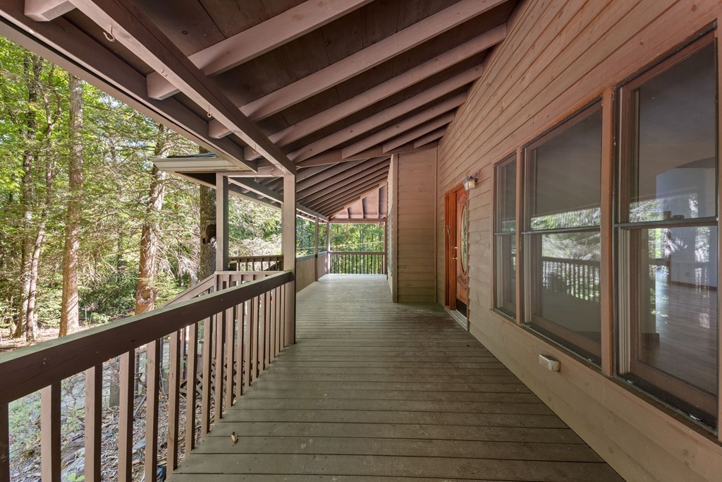 101 Menagerie Ridge Epworth, GA 30541 - Photo 47 of 48 a view of a porch with wooden floor