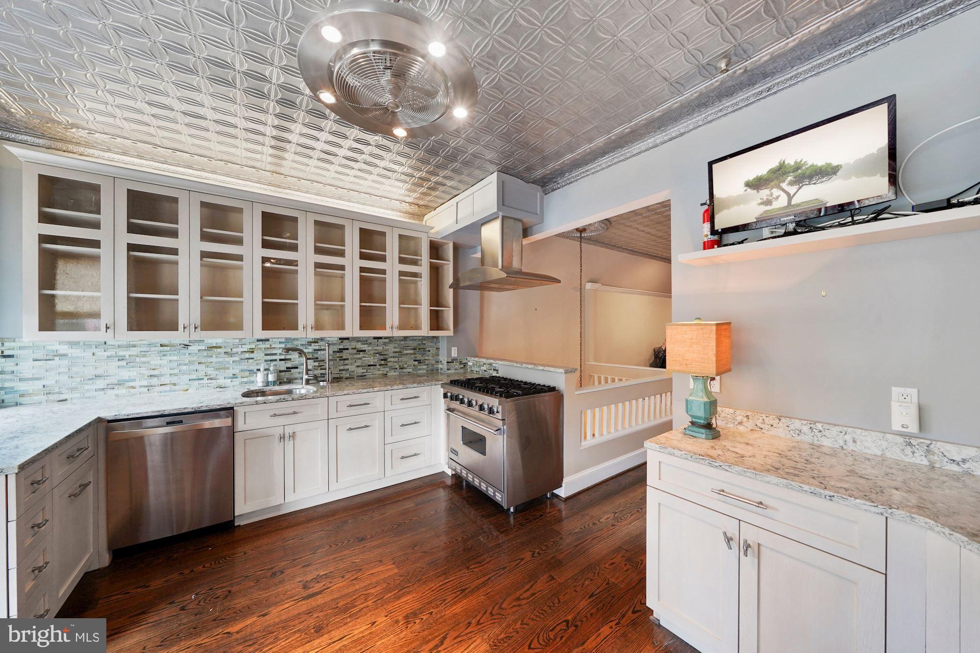514 Seward Square Southeast Washington, DC 20003 - Photo 15 of 30 Glass front cabinets and stainless appliances