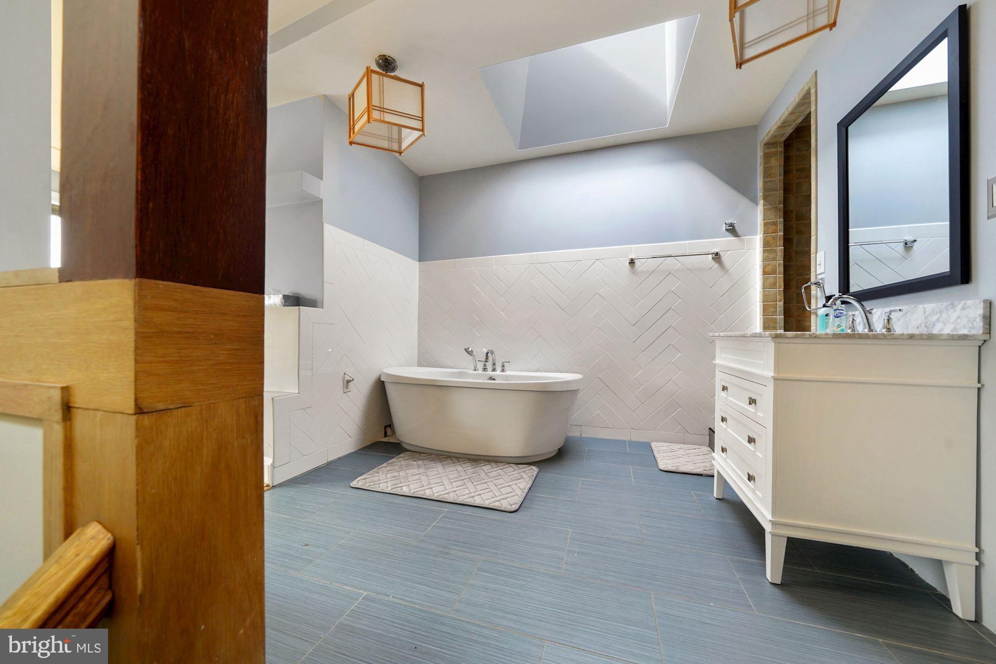 514 Seward Square Southeast Washington, DC 20003 - Photo 23 of 30 Primary bath with soaking tub and separate shower