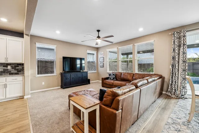 a kitchen with a table and chairs in it
