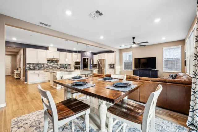 a bathroom with a sink double vanity and a mirror