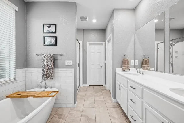 a view of a porch with furniture and a yard