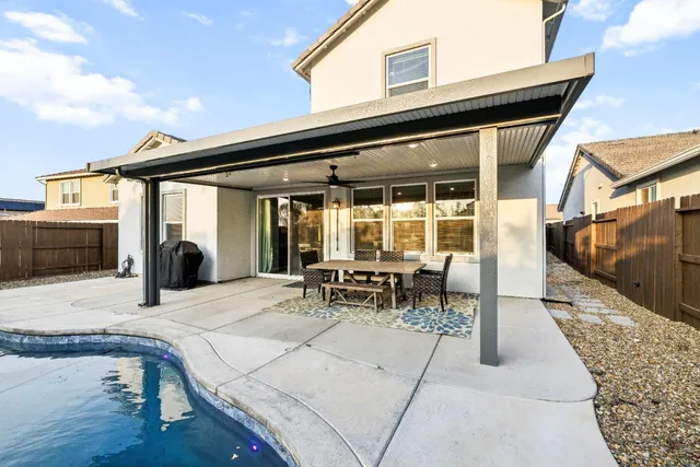 a bathroom with a sink toilet and mirror