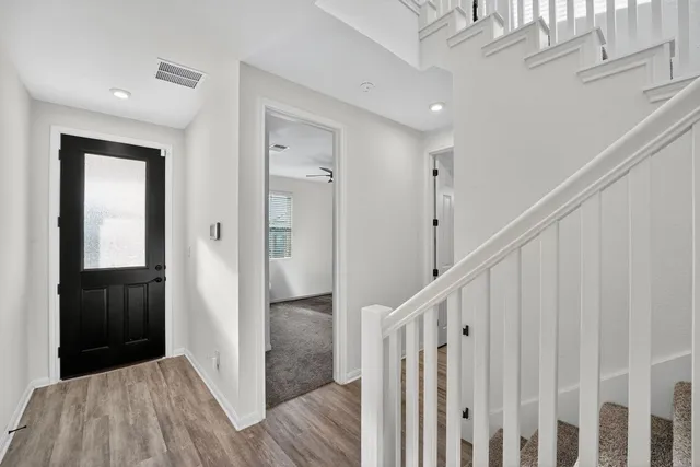 a view of hallway with stairs