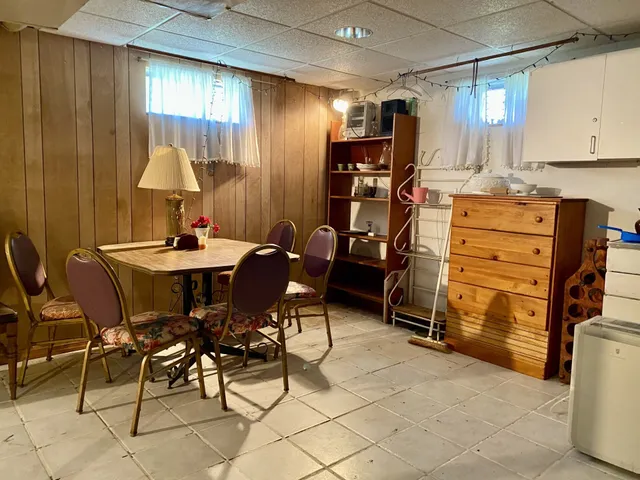 a view of a dining room with furniture