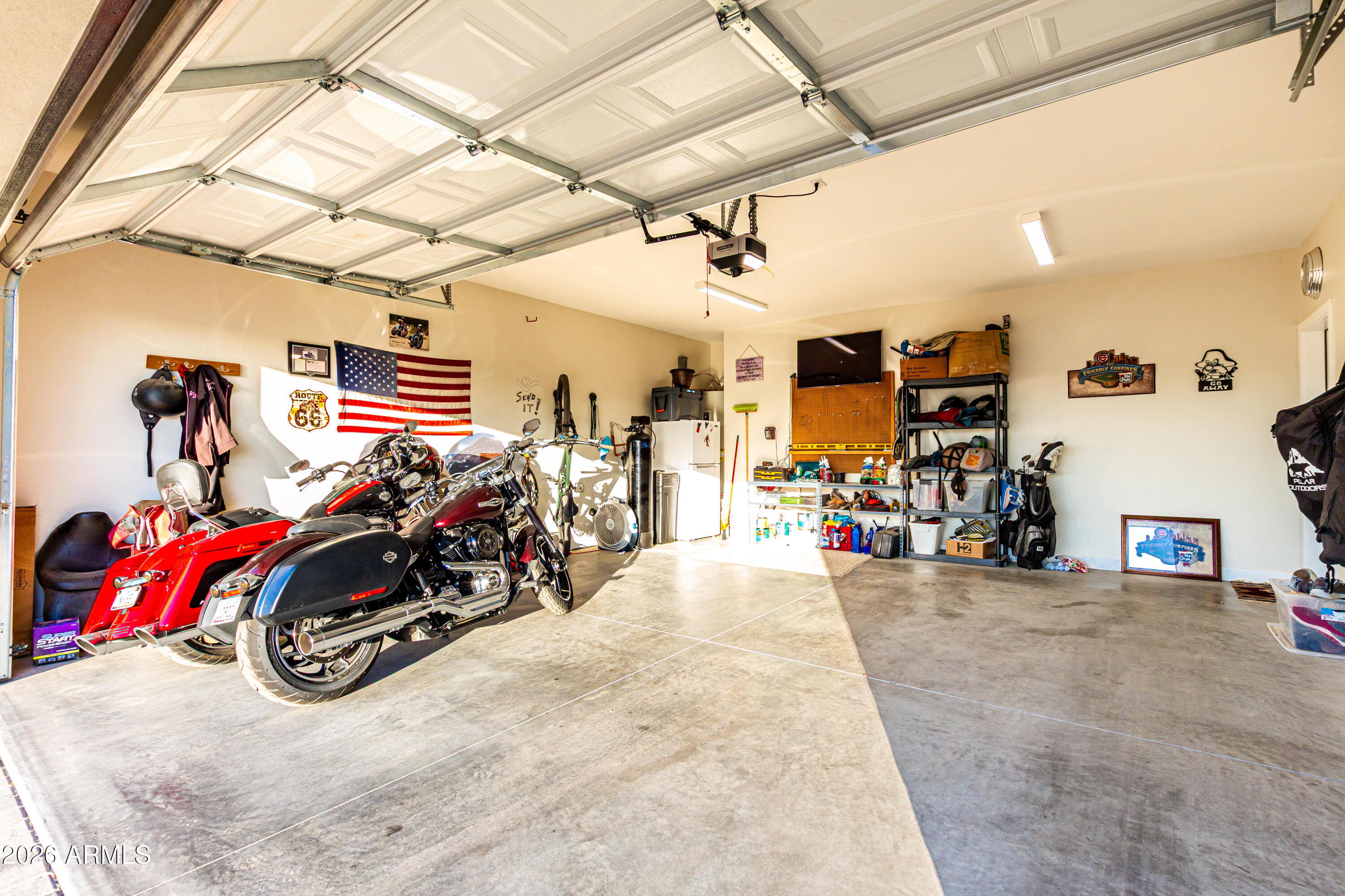 990 North Muleshoe Road Apache Junction, AZ 85119 - Photo 23 of 34 a view of a garage with a bike and car