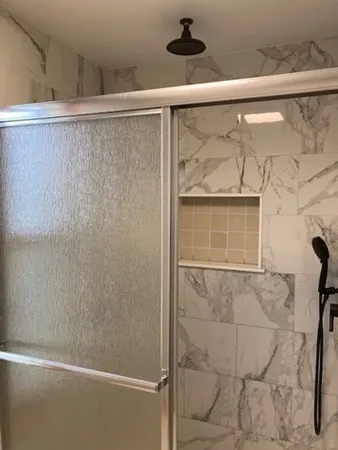 a bathroom with a sink a toilet and vanity