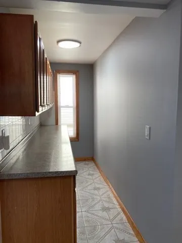 a view of hallway with stairs