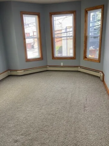 an empty room with window