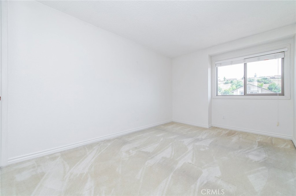 19621 Running Brand Circle Walnut, CA 91789 - Photo 25 of 40 an empty room with windows