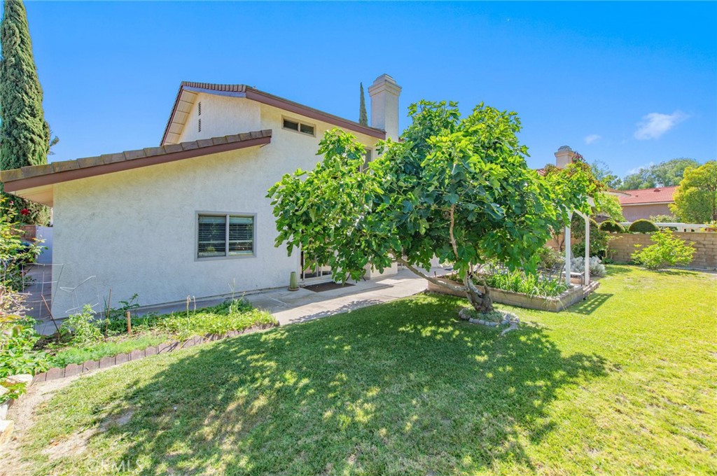19621 Running Brand Circle Walnut, CA 91789 - Photo 38 of 40 a front view of a house with garden