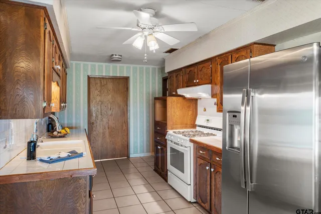 a view of an entryway with wooden floor and a window