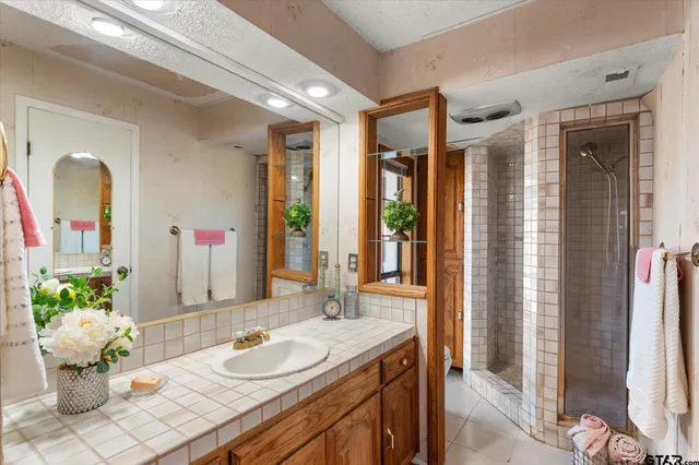 a bed room with a bed and a couch