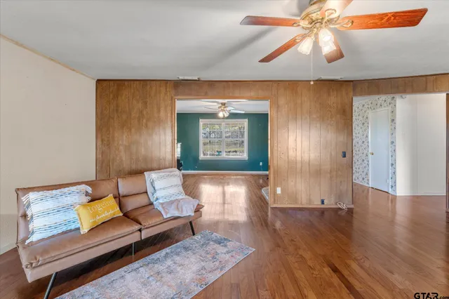 a view of a livingroom with furniture and a fireplace