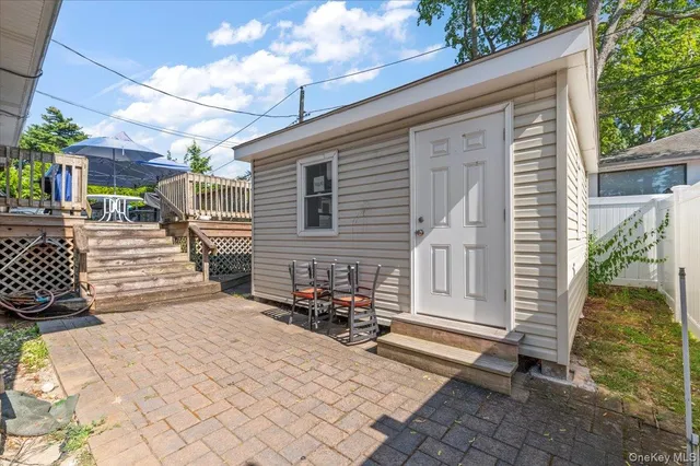 a view of a two chair in the patio