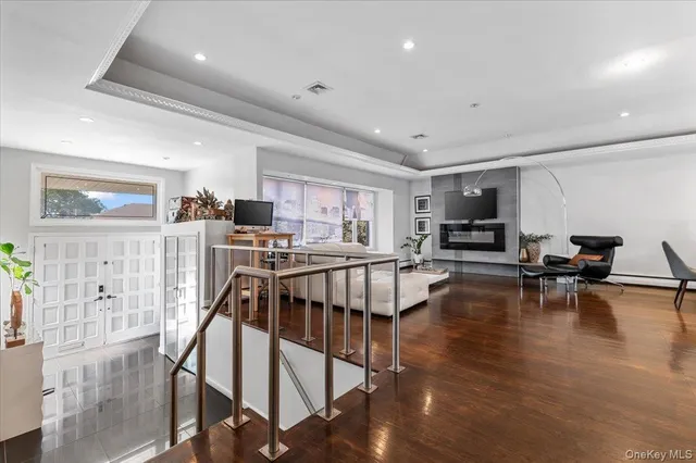 a view of kitchen with furniture and wooden floor