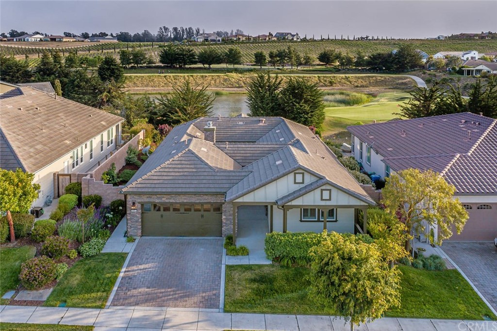 1397 Vicki Lane Nipomo, CA 93444 - Photo 1 of 49 an aerial view of a house with a lake view