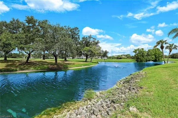 a view of a lake with houses