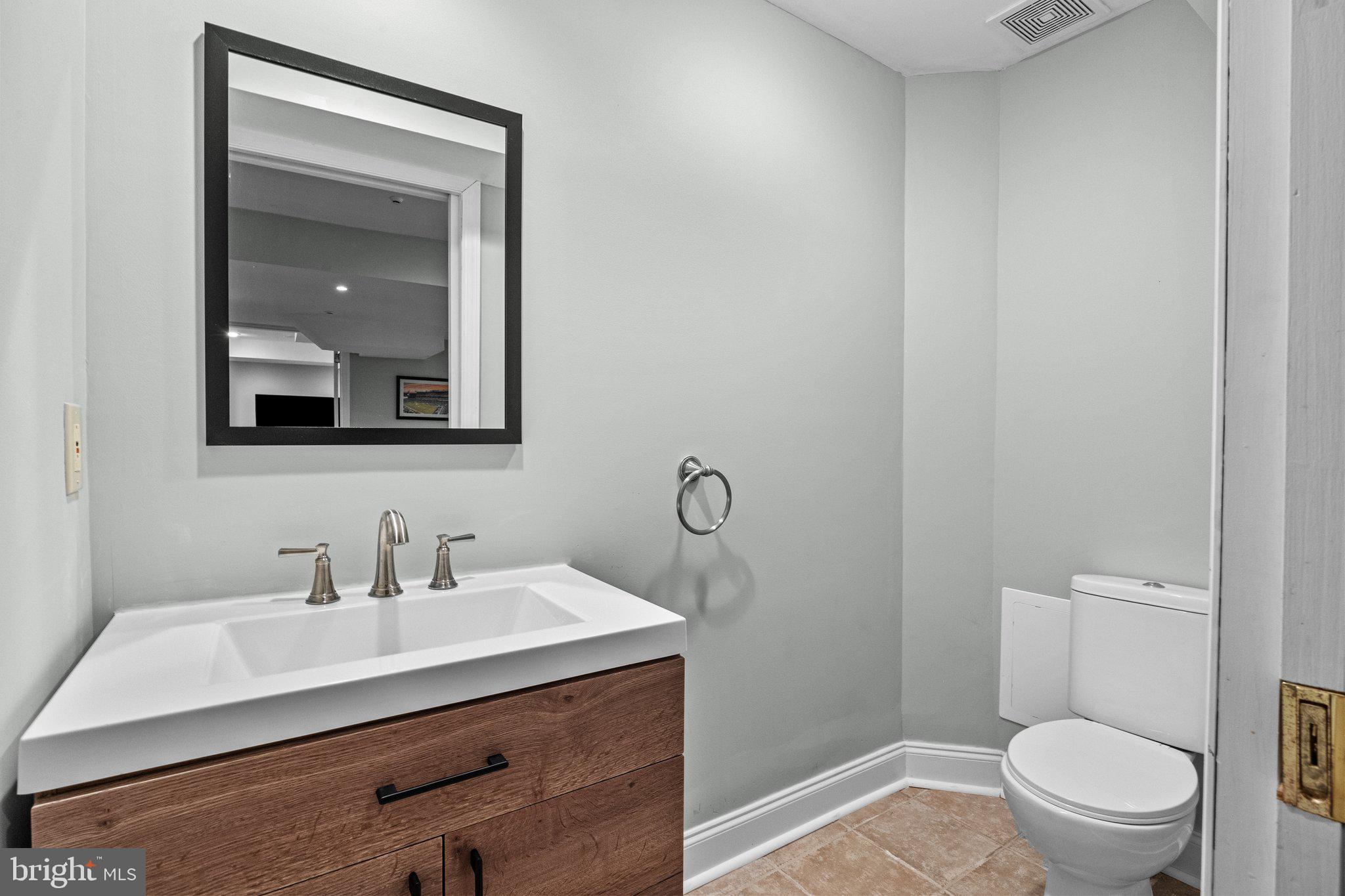 384 Ridge Avenue Newtown, PA 18940 - Photo 51 of 82 Finished Basement Powder Room