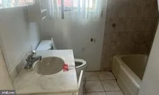 a bathroom with a sink and bathtub