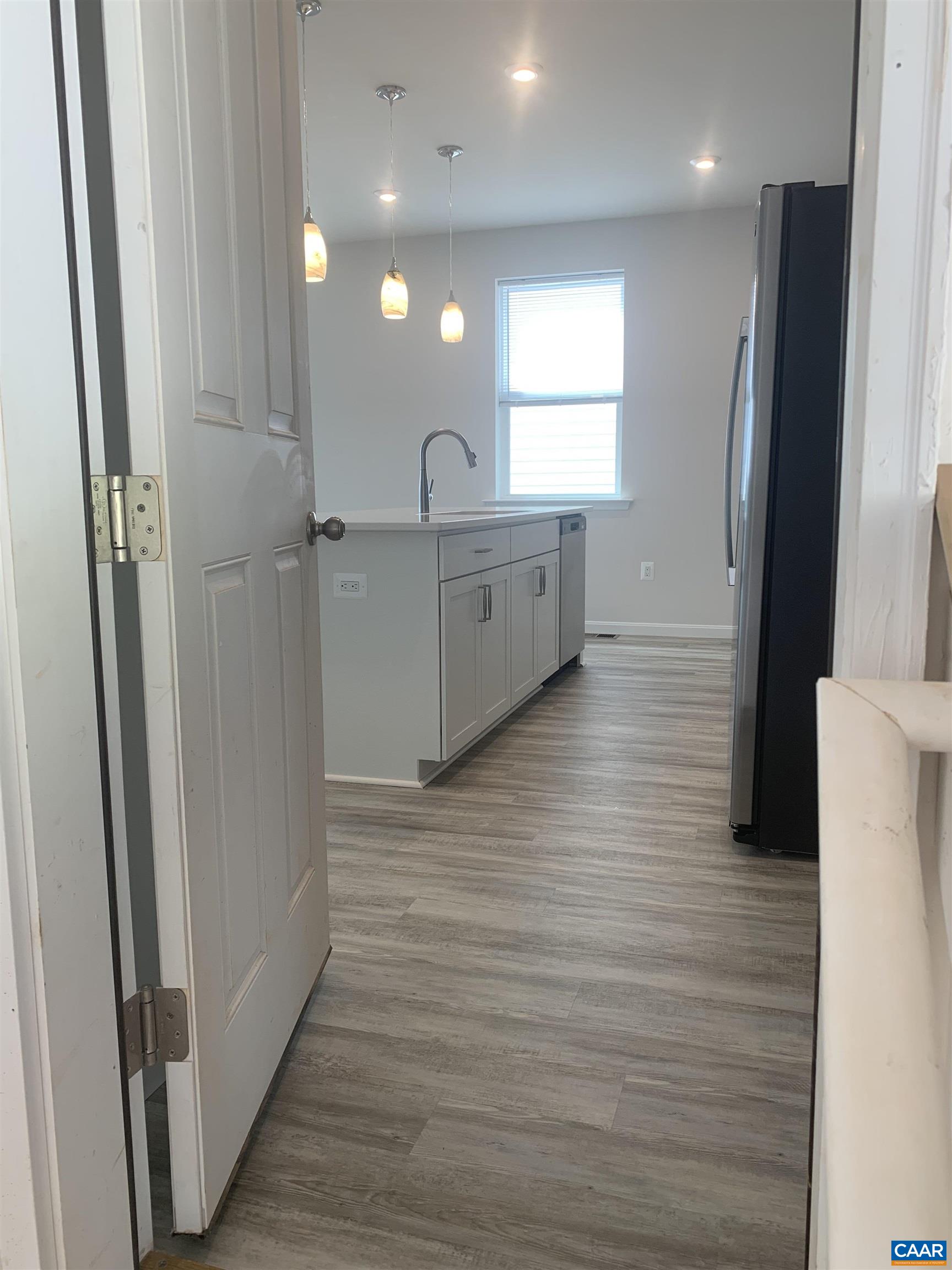758 Round Hill Road Orange, VA 22960 - Photo 5 of 23 a bathroom with a sink a mirror and a shower