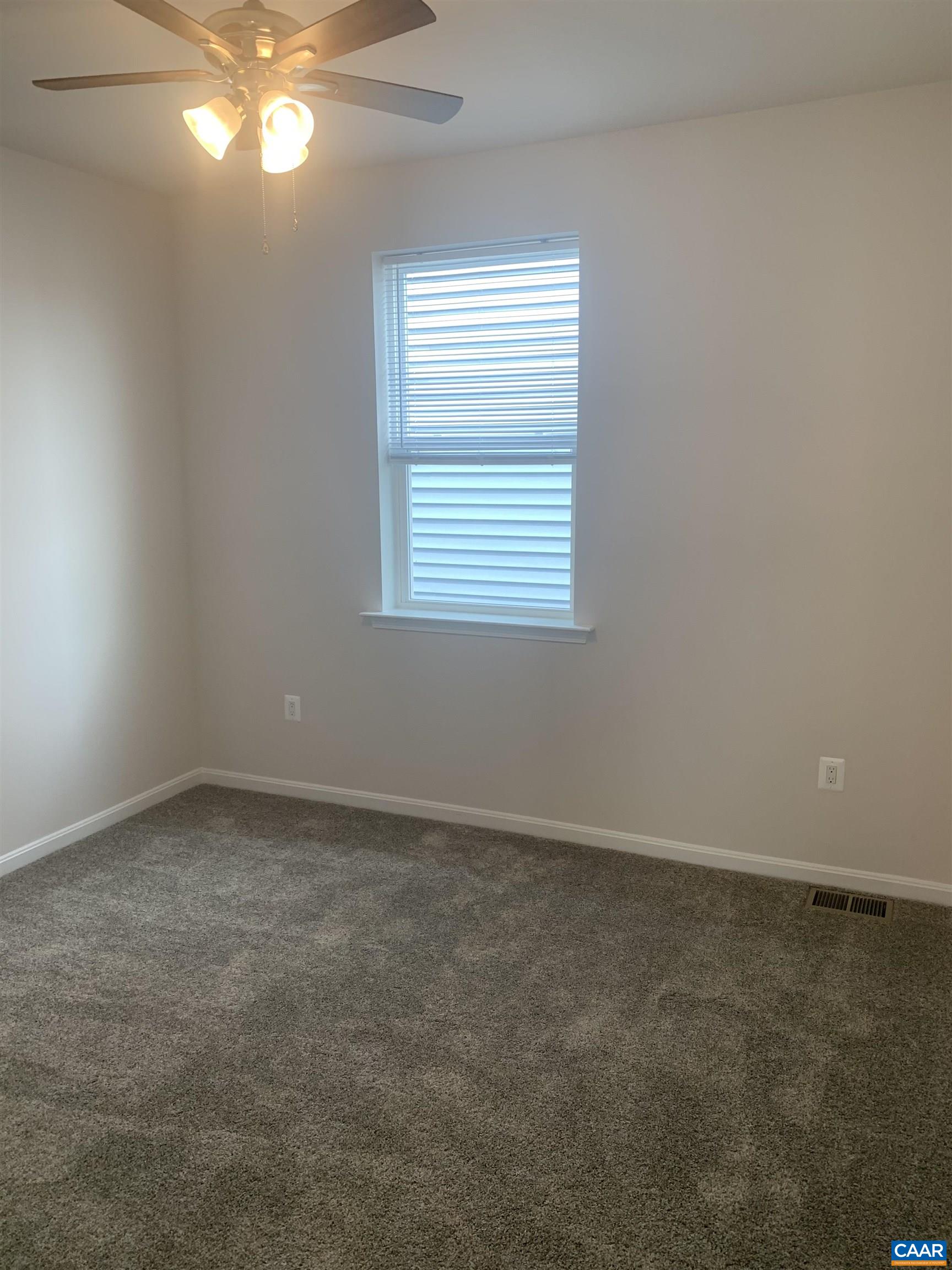 758 Round Hill Road Orange, VA 22960 - Photo 9 of 23 an empty room with a window