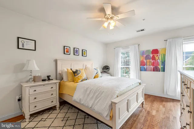 a bedroom with a bed and a cabinets