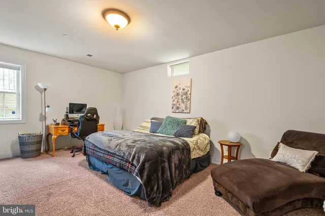 a view of a lake with houses in the back