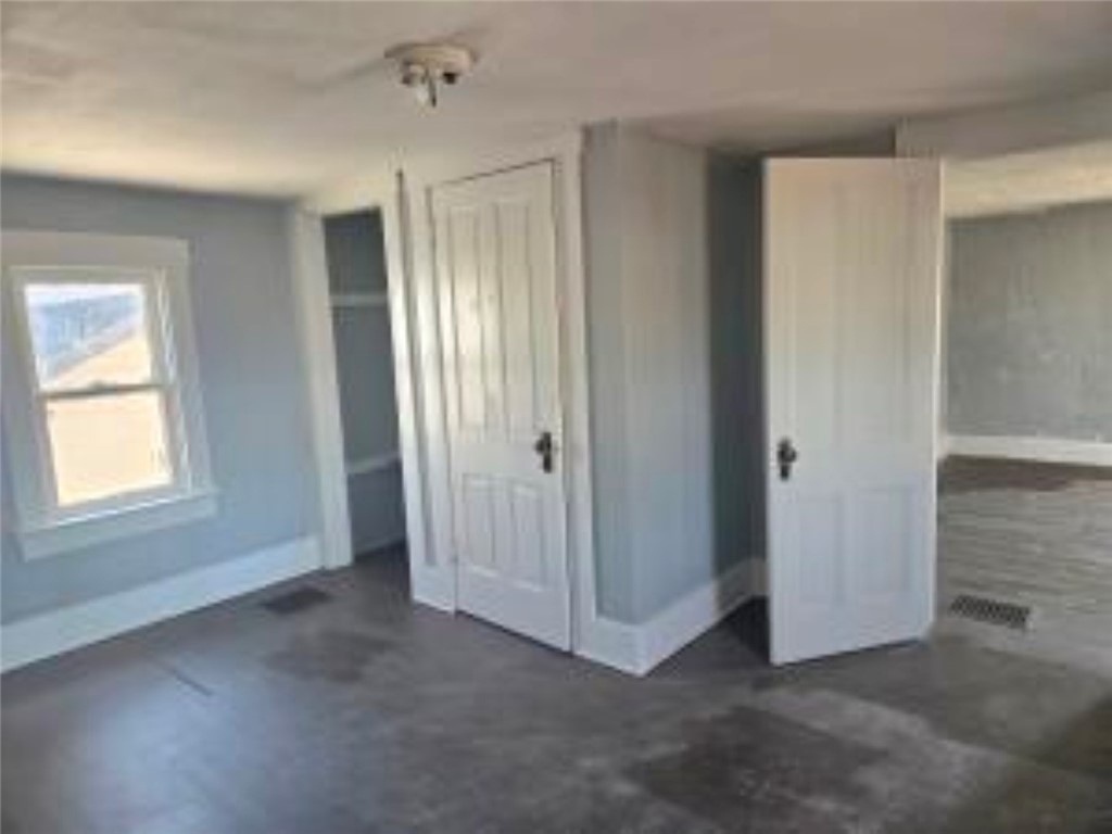 820 West North Street Springfield, OH 45504 - Photo 20 of 20 This bright room features durable flooring and ample natural light, creating a versatile living space.