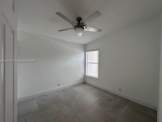 11572 Timbers Way, Unit 11572 Boca Raton, FL 33428 - Photo 13 of 22 a view of an empty room with a window