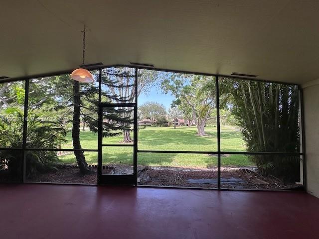 11572 Timbers Way, Unit 11572 Boca Raton, FL 33428 - Photo 18 of 22 a view of a porch with a yard