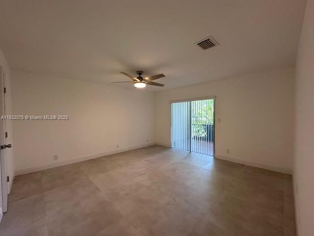 11572 Timbers Way, Unit 11572 Boca Raton, FL 33428 - Photo 8 of 22 a view of an empty room with a window