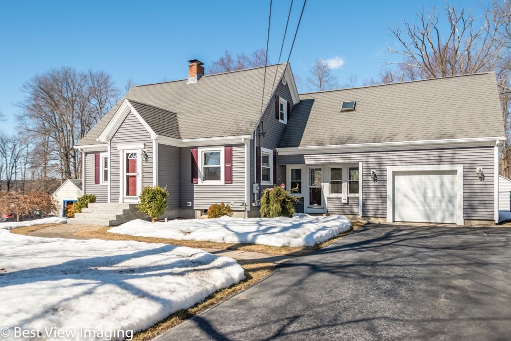 a view of a house with snow on the ground