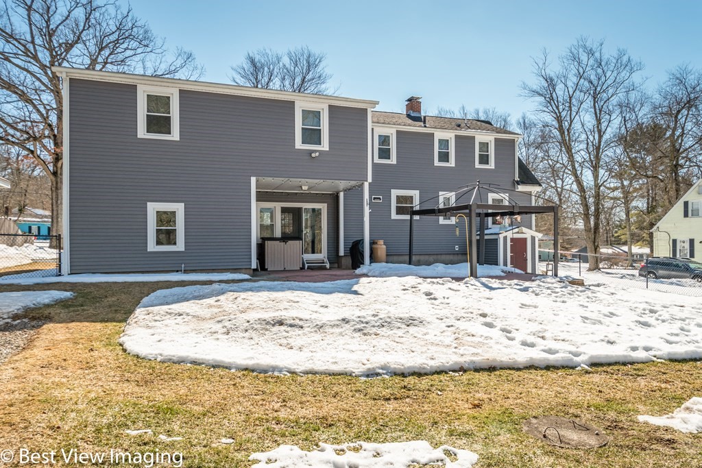 118 Goldthwaite Road Northbridge, MA 01588 - Photo 23 of 24 a view of a house with a yard covered in snow