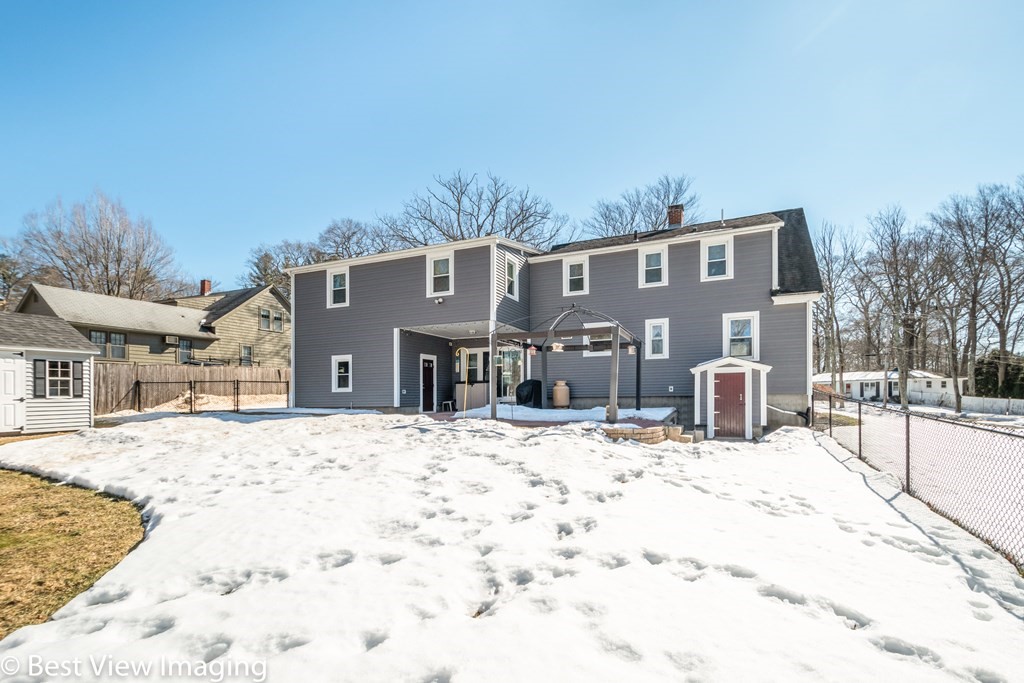 118 Goldthwaite Road Northbridge, MA 01588 - Photo 24 of 24 a front view of a house with a yard covered in snow