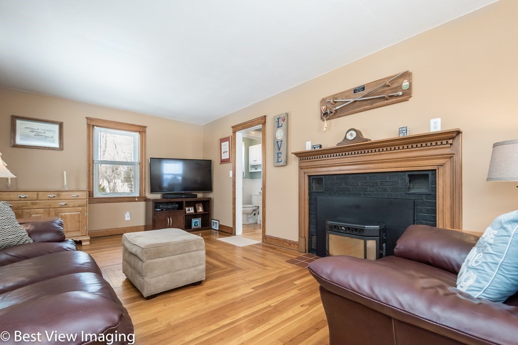118 Goldthwaite Road Northbridge, MA 01588 - Photo 5 of 24 a living room with furniture and a flat screen tv