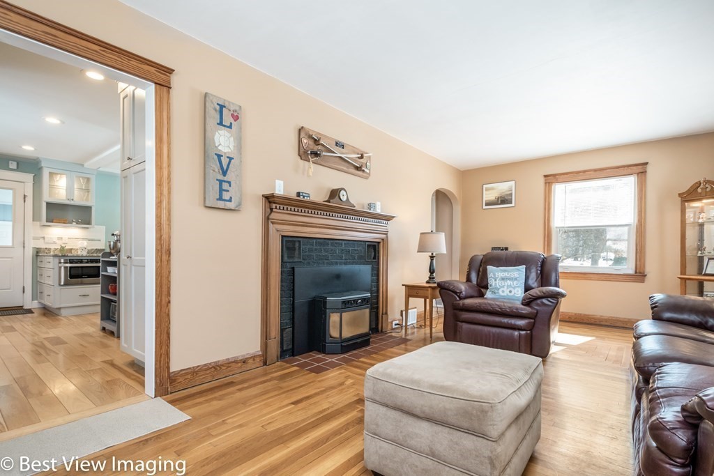 118 Goldthwaite Road Northbridge, MA 01588 - Photo 6 of 24 a living room with furniture and a fireplace