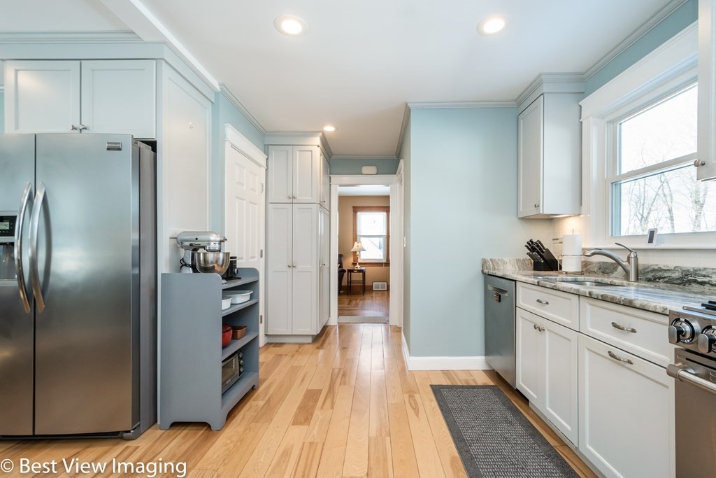 118 Goldthwaite Road Northbridge, MA 01588 - Photo 9 of 24 a kitchen with stainless steel appliances a refrigerator sink and cabinets