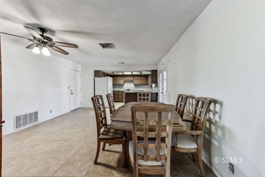 301 South Lincoln Street Ridgecrest, CA 93555 - Photo 6 of 20 a view of a dining room that has a table and chairs