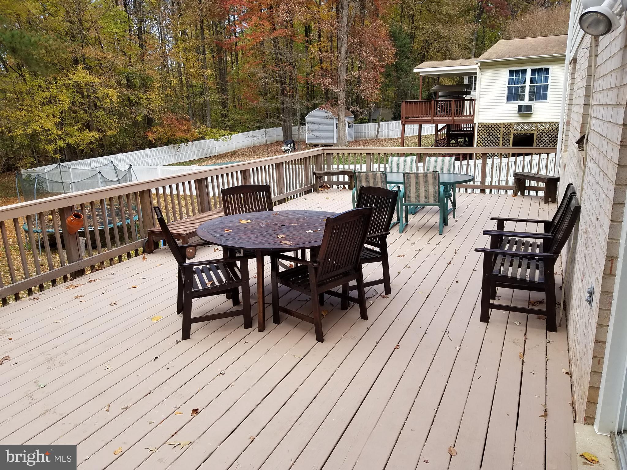 6955 Conservation Drive Springfield, VA 22153 - Photo 19 of 42 Large deck perfect for entertaining.