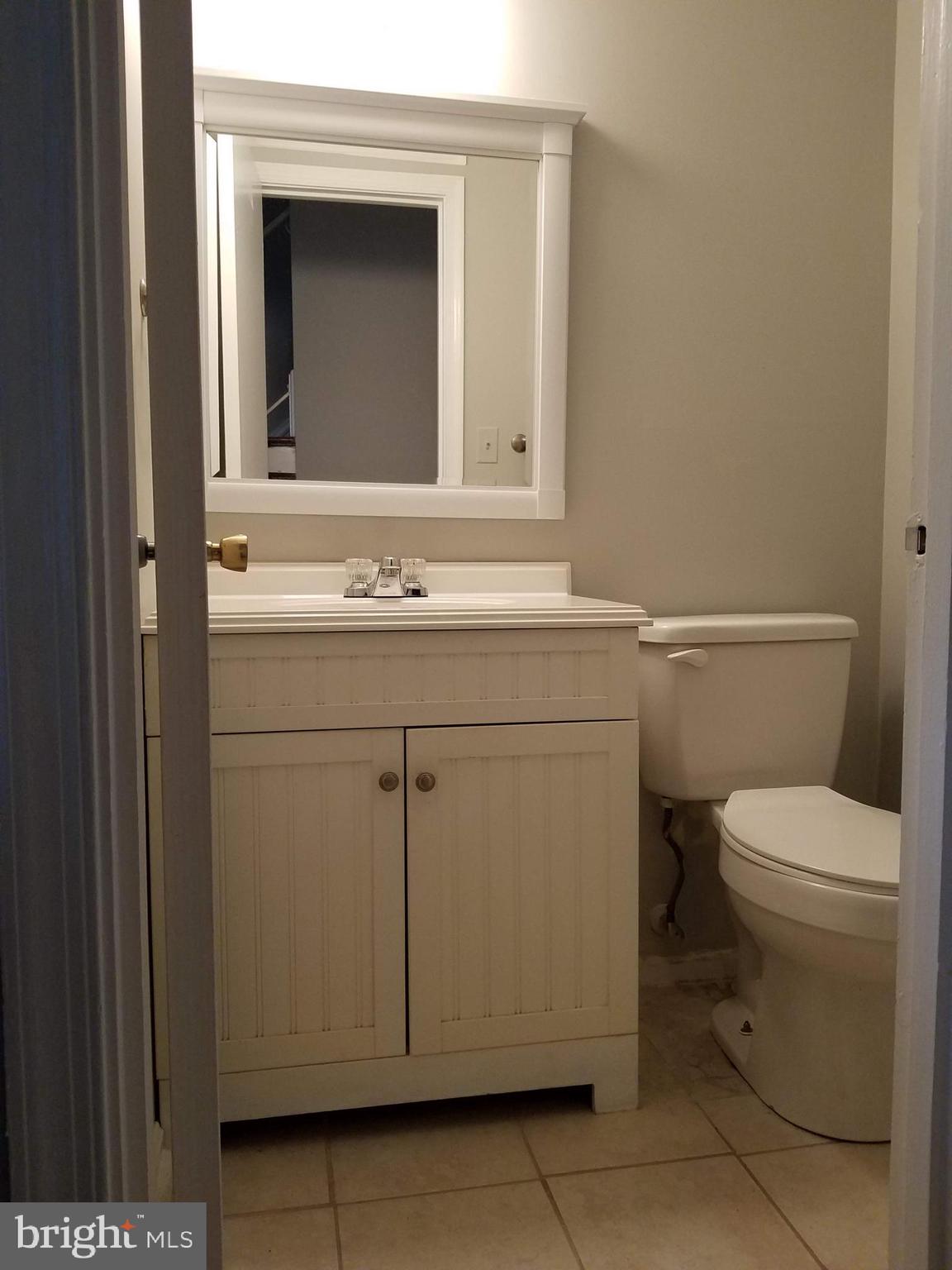 6955 Conservation Drive Springfield, VA 22153 - Photo 8 of 42 Half bath on main floor