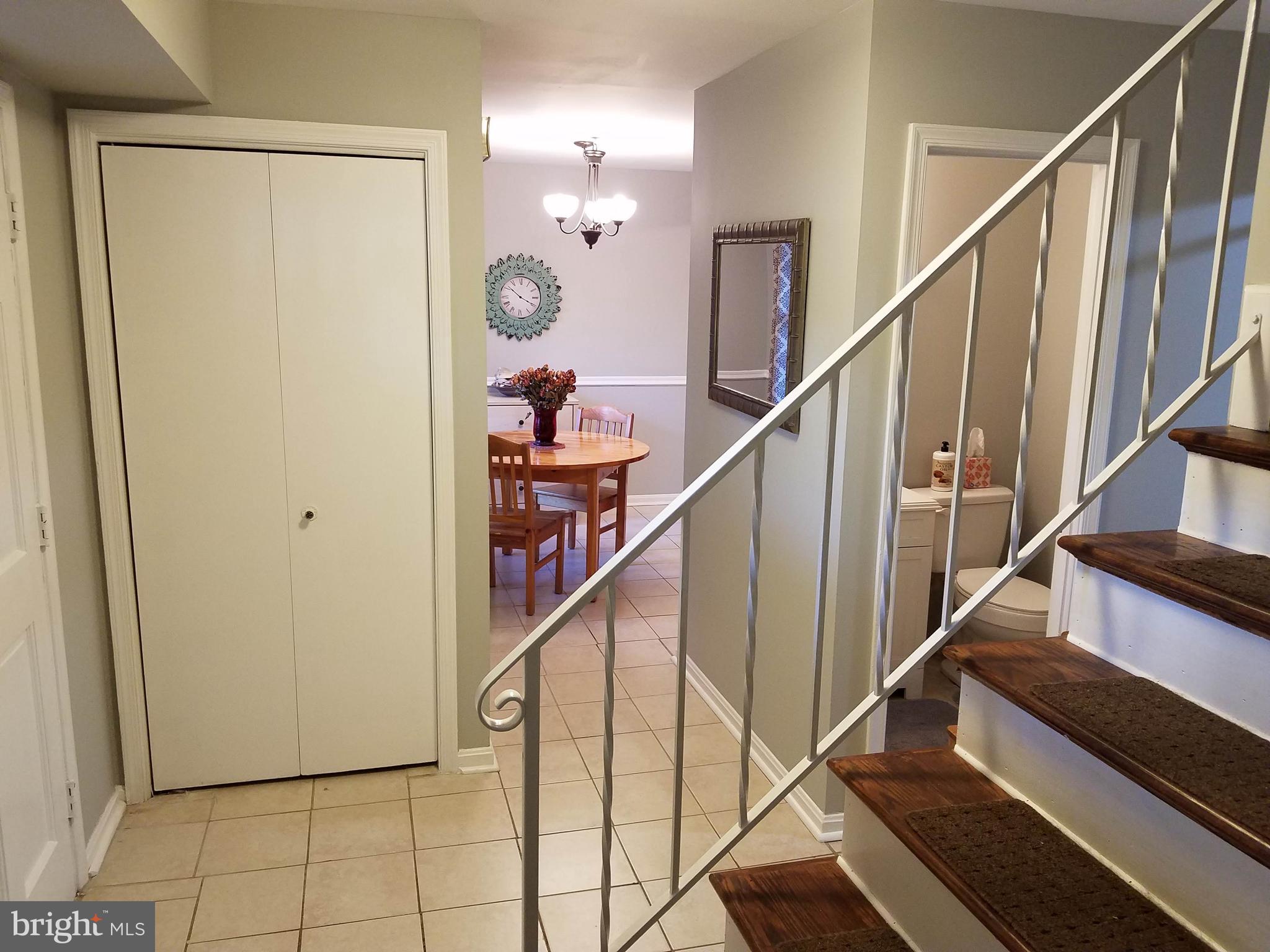 6955 Conservation Drive Springfield, VA 22153 - Photo 9 of 42 Front entry area leading to the kitchen