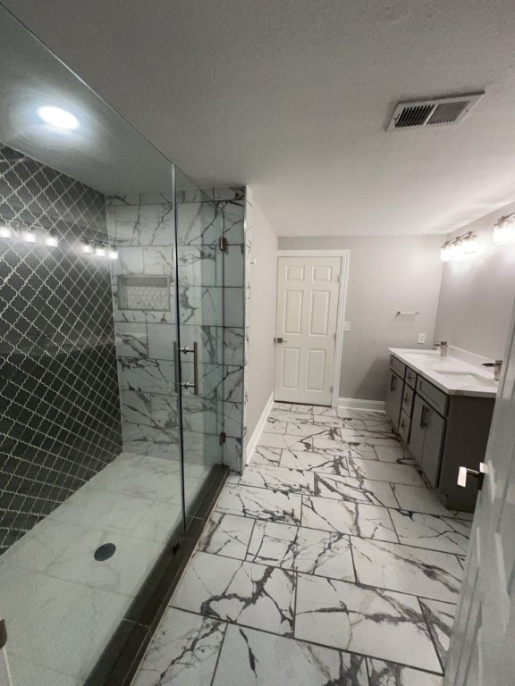 401 Walton Street Houston, TX 77009 - Photo 22 of 27 a bathroom with a shower and a sink