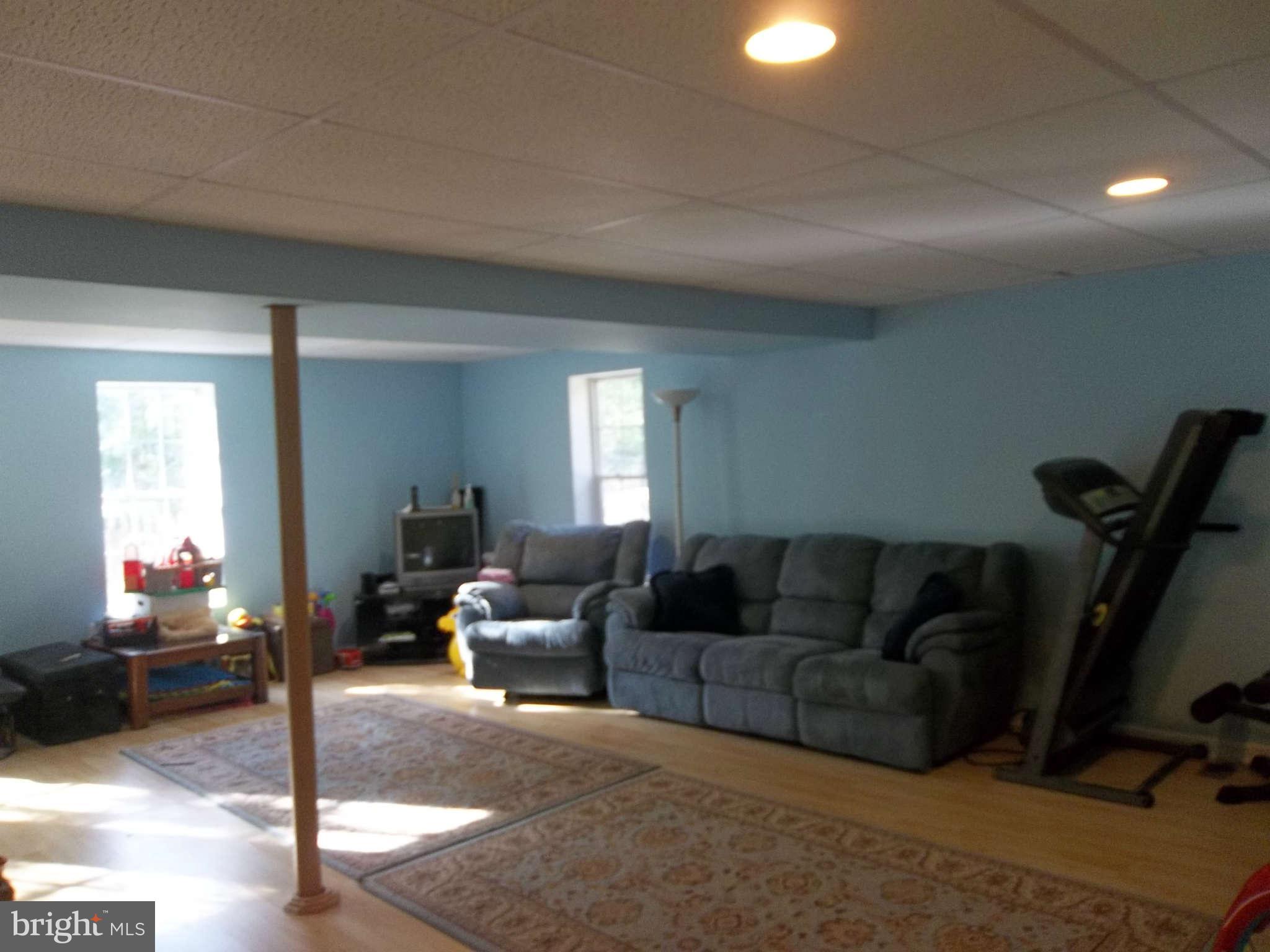 12155 Gringo Road Lusby, MD 20657 - Photo 21 of 28 Family Room