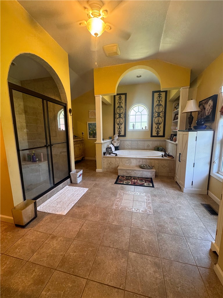 208 Knoxwood Court Anderson, SC 29621 - Photo 21 of 38 This spacious bathroom offers a large shower and a luxurious soaking tub for ultimate relaxation.