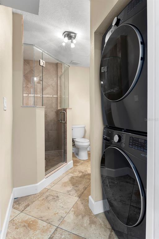 708 Sunset Cove Madeira Beach, FL 33708 - Photo 12 of 61 a bathroom with a toilet and a sink
