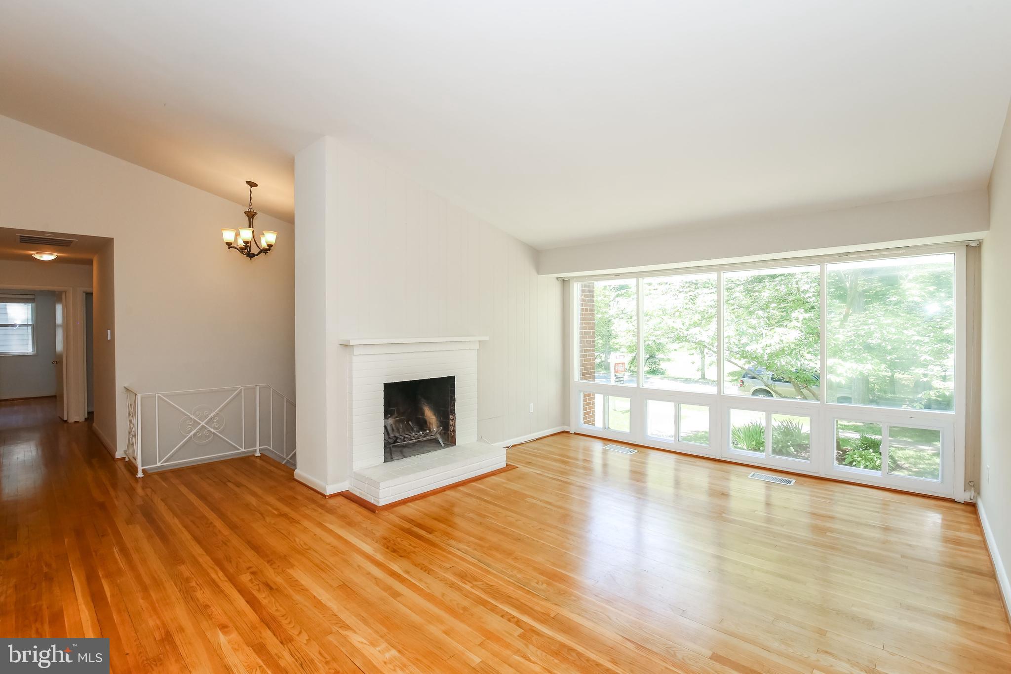 8401 Beech Tree Road Bethesda, MD 20817 - Photo 3 of 18 Living Room with Soaring Ceiling