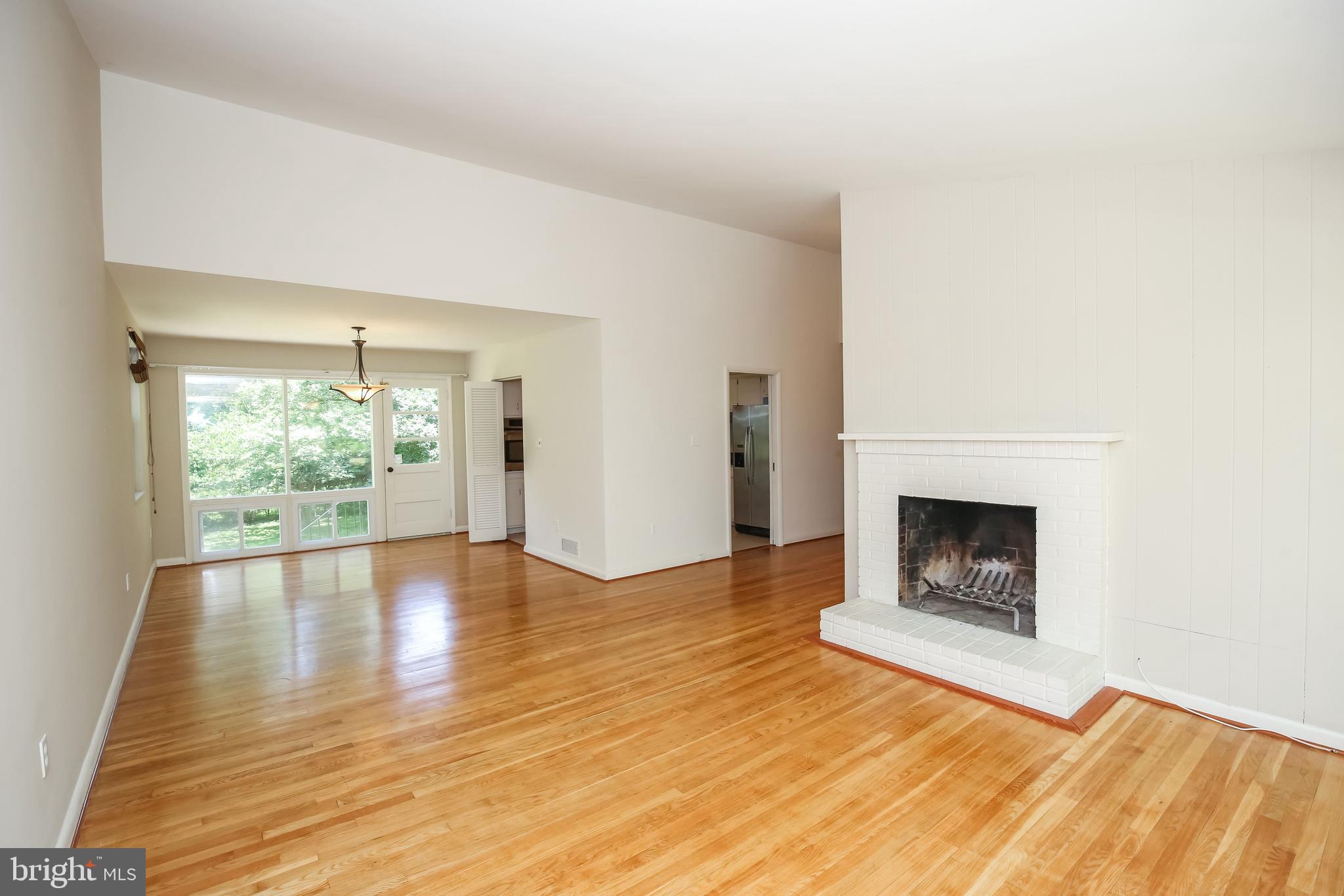 8401 Beech Tree Road Bethesda, MD 20817 - Photo 4 of 18 Living Room Open to Dining Room