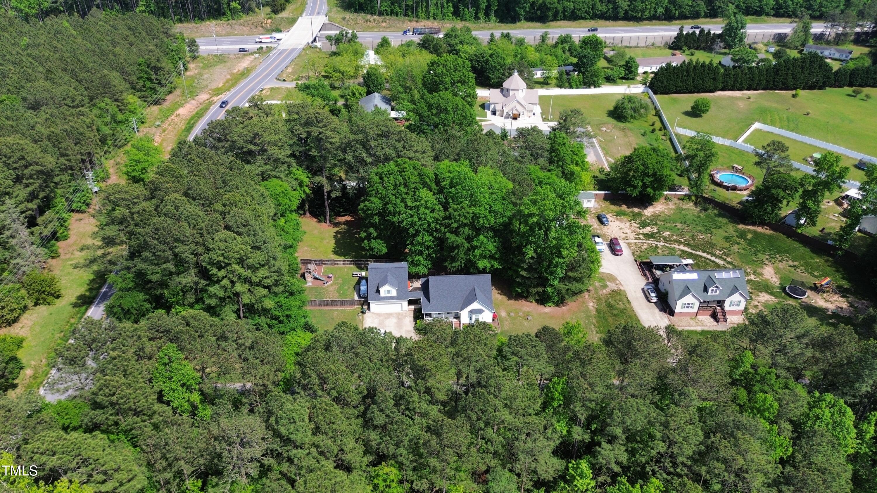 7909 Independent Court Garner, NC 27529 - Photo 10 of 11 an aerial view of house with yard swimming pool and outdoor seating